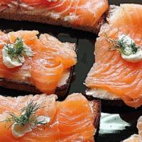 Cured Salmon Crostini · Cured Salmon, Cream Cheese, Dill On A Toast.