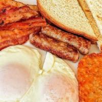 American Breakfast · Your choice of toast, bacon or sausage, 2 eggs any style, Hash Brown.