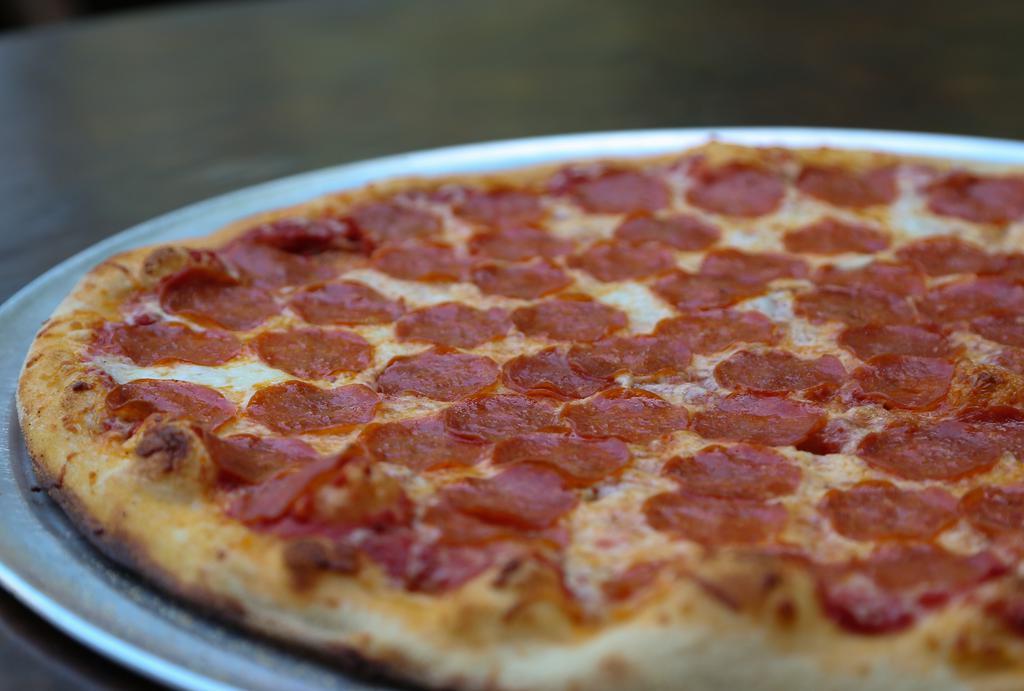 Large Pepperoni Pizza · Fresh mozzarella, crisp pepperoni, house made pizza sauce