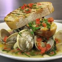 Steamed Littleneck Clams · With white wine, tomatoes, garlic, shallots and grilled ciabatta.