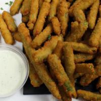 Crispy Green Beans · Toasted onion battered green beans fried served with wasabi ranch.