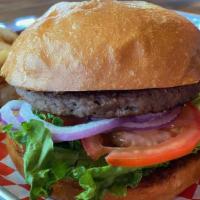 Impossible Burger · Plant-based burger, lettuce, tomato, onion, and spicy tomato relish on a toasted brioche bun.