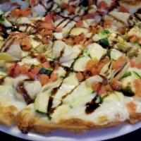 Veggie Pizza (Large) · 12 slices. Rustic tomato sauce, mozzarella, bell peppers, broccoli, red onions, artichoke he...