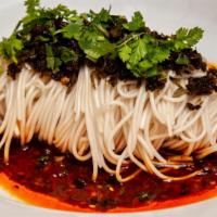 Dan Dan Noodle · Ground pork, cilantro and chili sauce.