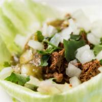 Low Carb Taco · Your choice of meat. Served on a lettuce wrap with onions, cilantro, and salsa verde.