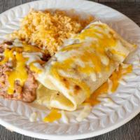K) Bean And Cheese Burrito · Topped with melted cheese. Add meat for additional charge.