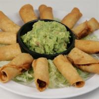 Taquitos Botana · 12 halves of beef or chicken taquitos with guacamole.
