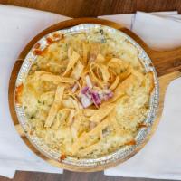Okey Dokey Artichokey · Parmesan, mozzarella and cream cheese mac with spinach artichoke dip topped with red onions ...