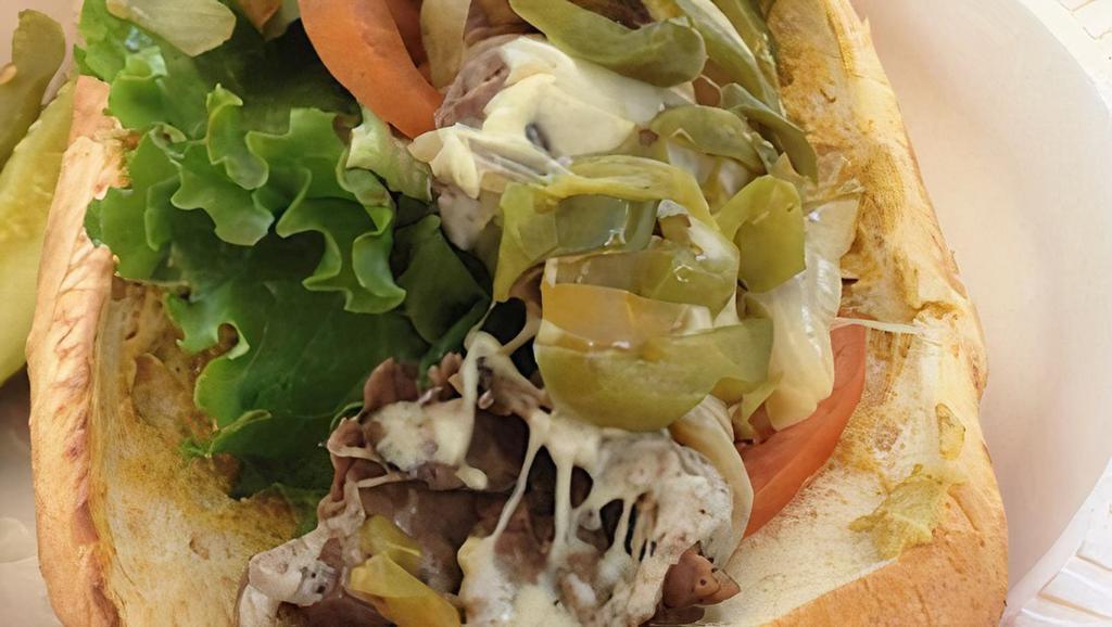 Philly Cheese Steak Combo · Premium Lean Roast Beef, Provolone Cheese, Grilled Onion & Bell Peppers.