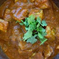 Chicken Tikka Masala · Traditional spiced tomato and creamy curry.