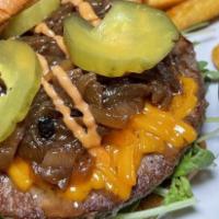 Good Vibe Burger · Impossible patty, 10k sauce, vegan Cheddar, caramelized onion, arugula, shallot jam, brioche...