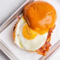 Breakfast Sandwich · Fried Egg, Cheddar Cheese, Bacon, Spicy Mayo, Brioche Bun