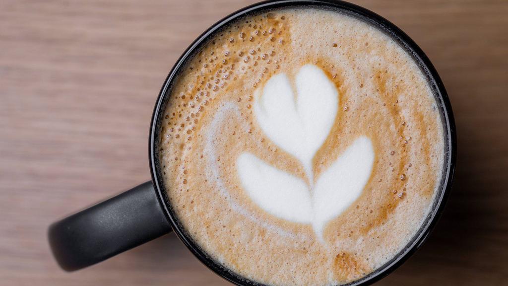 Latte · Double shot of espresso with hot steamed foamed milk