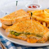 Annie'S House Sandwich · Choice of turkey or roast beef with avocado, thousand island dressing, jack and cheddar chee...