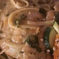 Hannah'S Chicken Piccata · Chicken sautéed in olive oil, capers, white wine, butter-lemon sauce, with fresh vegetables ...