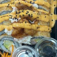 Empanizado Roll · Inside: shrimp, cucumber, Philadelphia, avocado. On top: breaded shrimp, topped with imitati...
