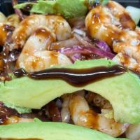 Cooked Shrimp Aguachile With Black Sauce · Cooked shrimp, mixed with black house sauce, onion, cucumber, and avocado on top.