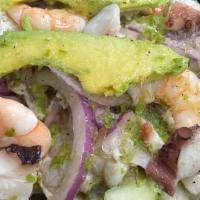 Criminal Mazatleco Verde · Shrimp cooked in lime juice, cooked shrimp, octopus, scallop mixed with greens chile sauce, ...