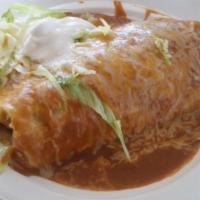 Wet Burrito · Choice of meat, rice, beans, cheese, onion, cilantro, salsa + wet sauce (sour cream and lett...