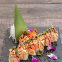 Wow Roll · Spicy, masago. Shrimp tempura and spicy crab salad roll topped with salmon, tuna, avocado, a...