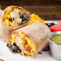 Breakfast Burrito · Scrambled eggs, seasoned black beans, cheddar cheese, bacon or veggie bacon and breakfast po...