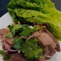 Water Fall Salad  · Grilled steak salad with lime dressing. (Thai Style)