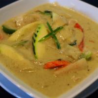 Green Curry · Comes with bell pepper, zucchini, carrot, bamboo and basil leaves.