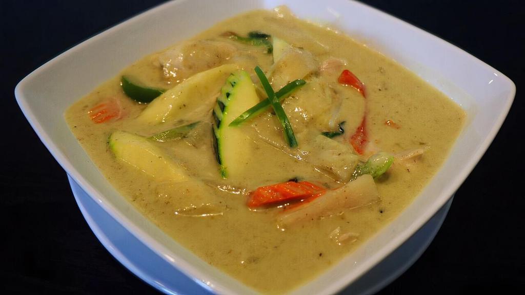 Green Curry · Comes with bell pepper, zucchini, carrot, bamboo and basil leaves.