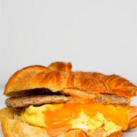 Croissant, Turkey Sausage, Egg, & Cheddar Sandwich · 2 scrambled eggs, melted Cheddar cheese, turkey breakfast sausage, and Sriracha aioli on a w...