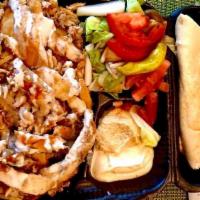 Chicken Shawarma Plate- # 1 · Chicken Shawarma is a tender marinated chicken breast filet, with our traditional Lebanese M...