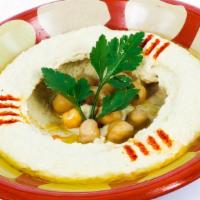 Hummus - Pita · Hummus is a smooth thick mixture of mashed chickpeas, mixed with tahini, lemon juice, and ga...