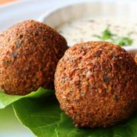 Falafel (3 Pc) · Falafel is a mixture of Grounded chickpea, Fava Beans  Onions, Parsley, Garlic, Cilantro &  ...