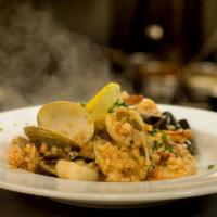 Risotto Frutti Di Mare · Fish of the day, prawns, scallops, calamari, clams, and mussels cooked and flavored in wine,...