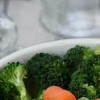 Steamed Vegetables - Small · One scoop of steam broccoli and carrots.  60 cal.