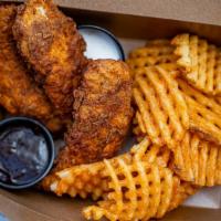 Chicken Tenders & Waffle Fries · two chicken tenders, waffle fries, 
Choice of 1 sauce: 
bbq, ranch, spicy ranch, Wagon honey...