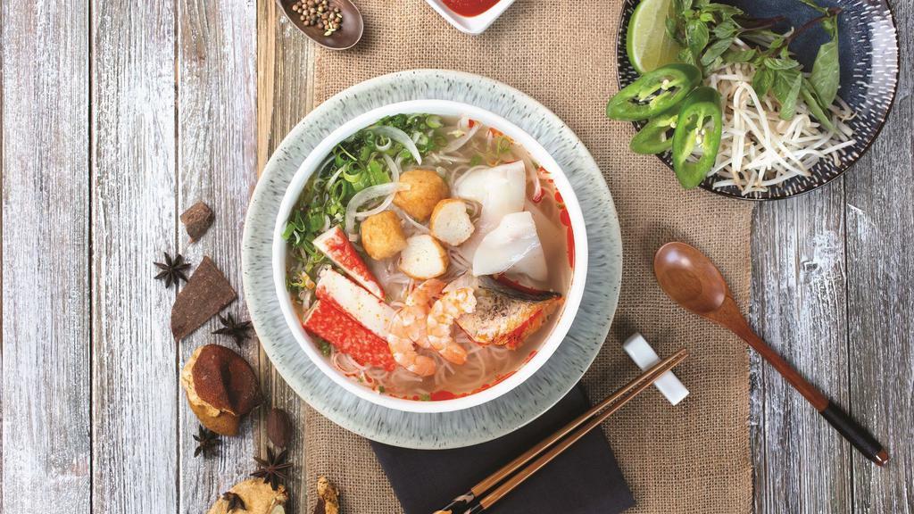 Phở Sa Tế Tom (Shrimps) · Mixed seafood such as shrimps, salmon, squid, fish balls; served in our spicy 12-hour bone broth