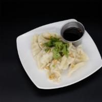 Dumplings (7) · Filled with tasty chicken and vegetable served with sweet & sour sauce or sweet black sauce....