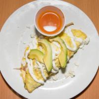 Omelette · With tomato sauce, avocado, mushrooms, onions, bell pepper, fresh cheese, sour cream.