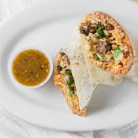 Burrito · Choose any meat, Inside burrito includes refried beans, rice, hot sauce, cilantro, and onions.