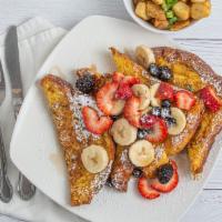 French Toast Waffle · A fluffy waffle battered and grilled like a fresh toast topped whit maple,  cream cheese and...