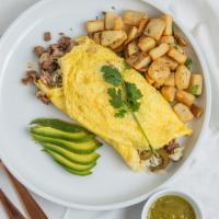California Omelet · Beef, american cheese, jalapeños and white cheddar cheese, choice of breakfast potato or fruit