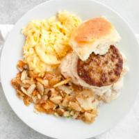 Joe'S Special · Two biscuit halves with sausage patties smothered in country gravy served with two eggs and ...