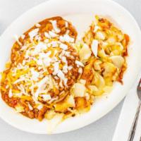 Chili Cheese · Topped with grated Cheddar and diced onions.
