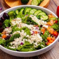 Greek Salad · Lettuce, tomatoes, onion, Kalamata olives, cucumber, feta cheese, Greek dressing.