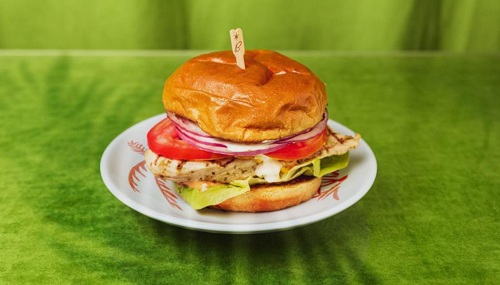 Grilled Chicken Sandwich · Grilled chicken with cheese, tomato, lettuce, onion, pickles, and house sauce.
