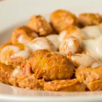 Gnocchi Ricotta · Potato dumplings prepared with marinara sauce and ricotta cheese, topped with baked mozzarel...