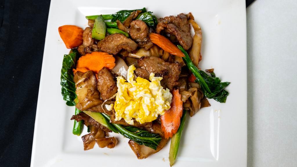 Pad See Ewe · Stir fried dry rice flat noodle, egg, Chinese broccoli.