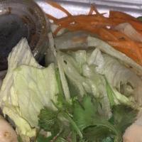 Thai Dumplings · Steamed or deep fried. Ground chicken, shrimp and vegetables served with black vinegar dippi...