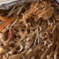 Pad Thai · Rice noodles made with eggs, bean sprout, green onion, crushed peanut, chicken and shrimp in...