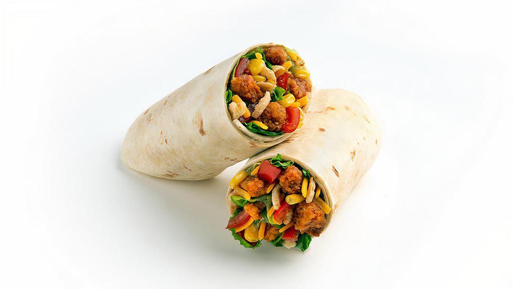 Bbq Crispy Chicken Wrap · This Chef-inspired Signature starts with a recommended base of Romaine/Iceberg Blend. Starting with a flour tortilla, it is served with BBQ Crispy Chicken, Chopped Tomatoes, Sweet Corn, Shredded Cheddar Cheese, and Onion Crisps. We recommend our Buttermilk Ranch dressing. All dressings will be served on the side.